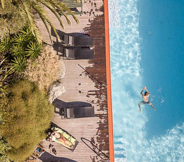 Person swimming in pool