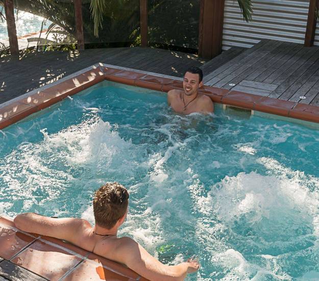 Guests relaxing in swimming pool