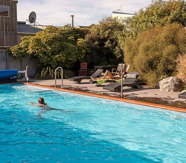 Guest Swimming in Dusky Lodge pool