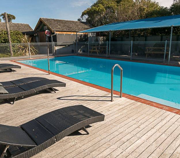 Loungers next to pool